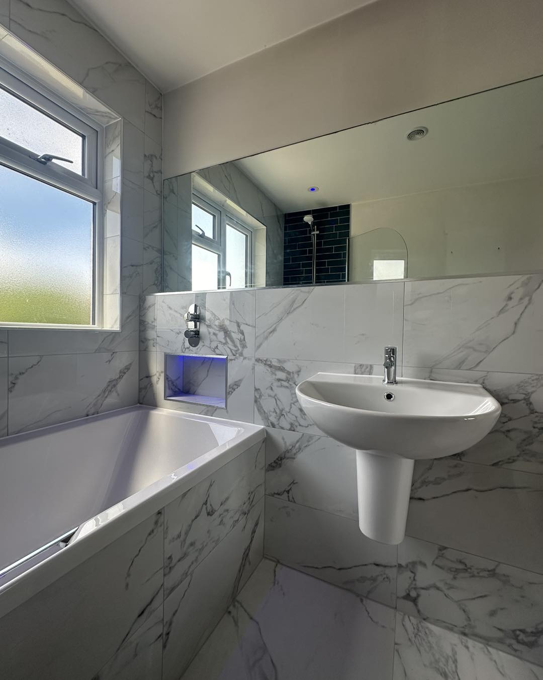 modern marble bathroom with full length mirror